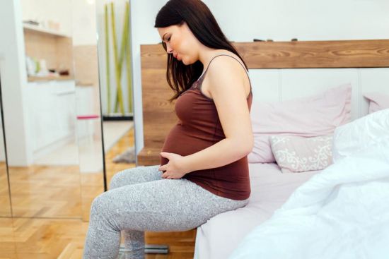 Дискомфорт в животе у беременной