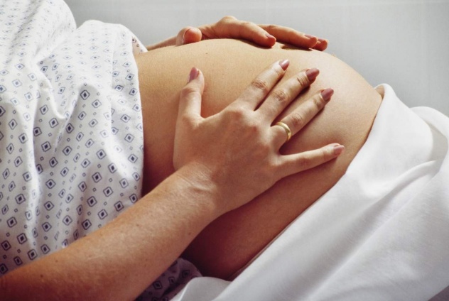 При беременности болит правый бок внизу живота
