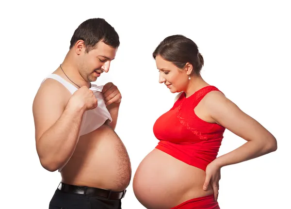 Беременная женщина и ее муж с большой живот — стоковое фото
