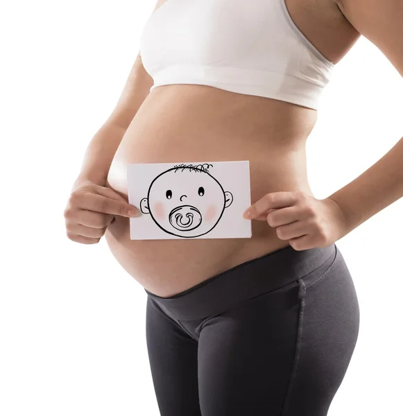 Беременная женщина держит карты — стоковое фото