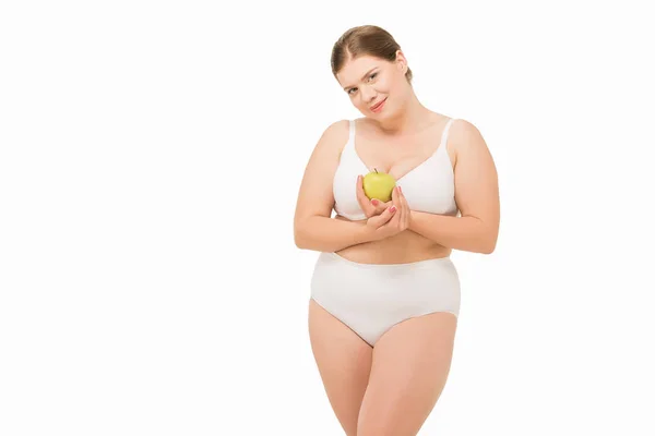 Избыточный вес женщина с яблоком — стоковое фото