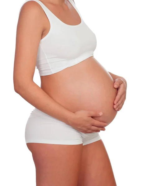Поглаживая живот беременной женщины — стоковое фото