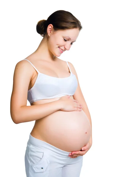 Беременная женщина, держащая копилку — стоковое фото